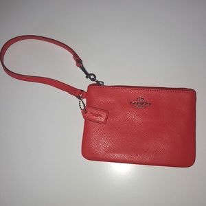 Orange coach wristlet